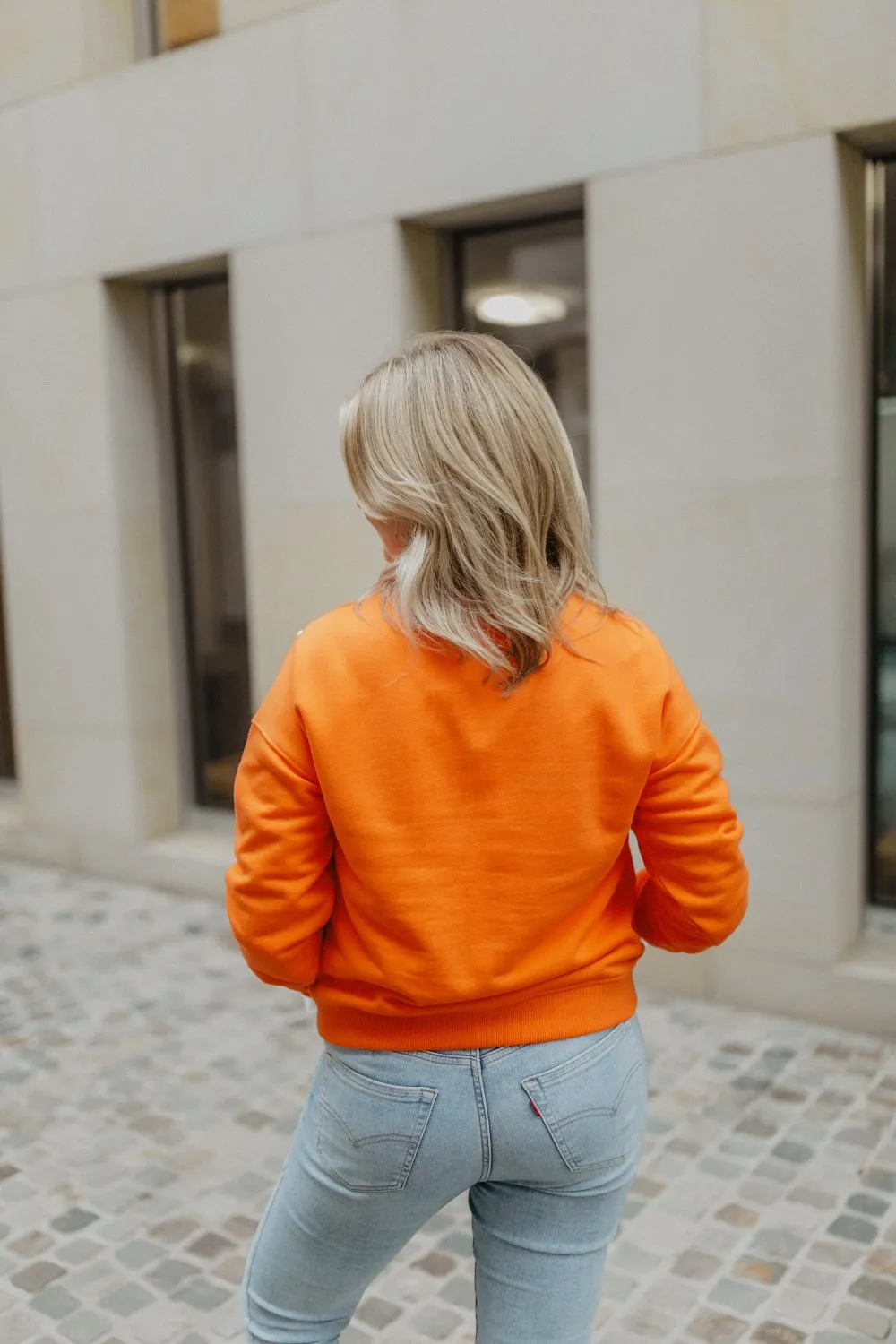 leevje by AM Sweater 'New York' orange mit Zierknöpfen